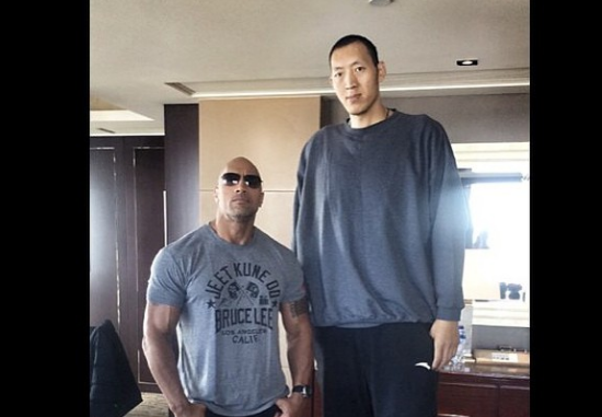 PHOTO | The Rock Looking Tiny Next To 7’9 Basketball Player