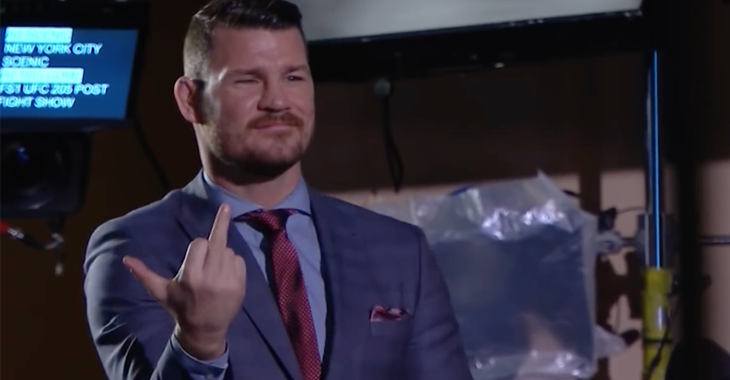 Michael Bisping gives Yoel Romero the finger