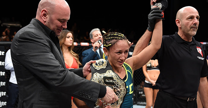 Dana-White-puts-belt-on-Carla-Esparza.png