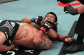 Chan Sung Jung with a choke out move