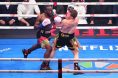 Canelo Alvarez gets hit with a punch by Terence Crawford