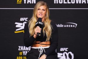 Kayla Harrison speaks to reporters