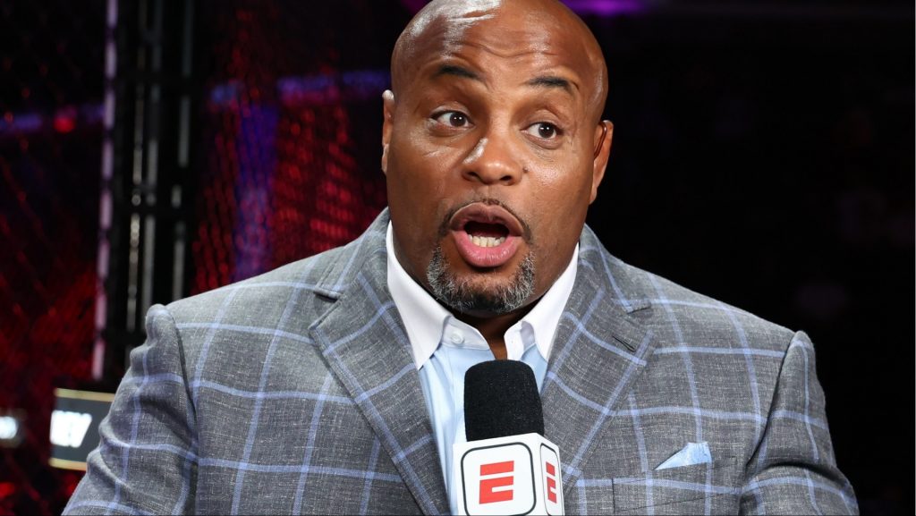 Daniel Cormier commentates cageside during a Dana White's Contender Series event