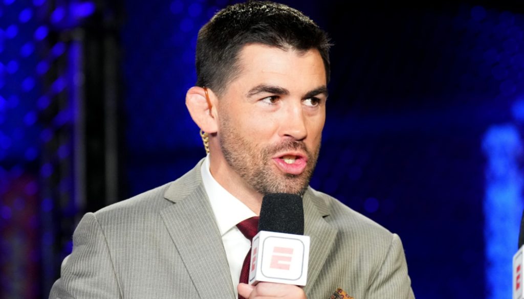 Dominick Cruz commentates cageside during a UFC event at the Apex