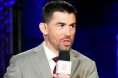 Dominick Cruz commentates cageside during a UFC event at the Apex
