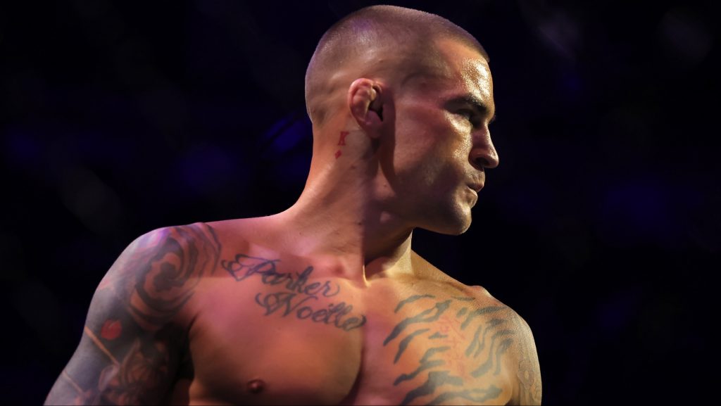 Dustin Poirier enters the Octagon for his fight against Max Holloway at UFC 318