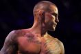 Dustin Poirier enters the Octagon for his fight against Max Holloway at UFC 318