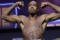 Jalin Turner poses on the scale for his fight against Renato Moicano at UFC 300