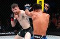 Cory Sandhagen punches Rob Font during UFC fight