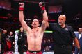 Dan Miragliotta raises Kyle Nelson's arm at UFC Vancouver