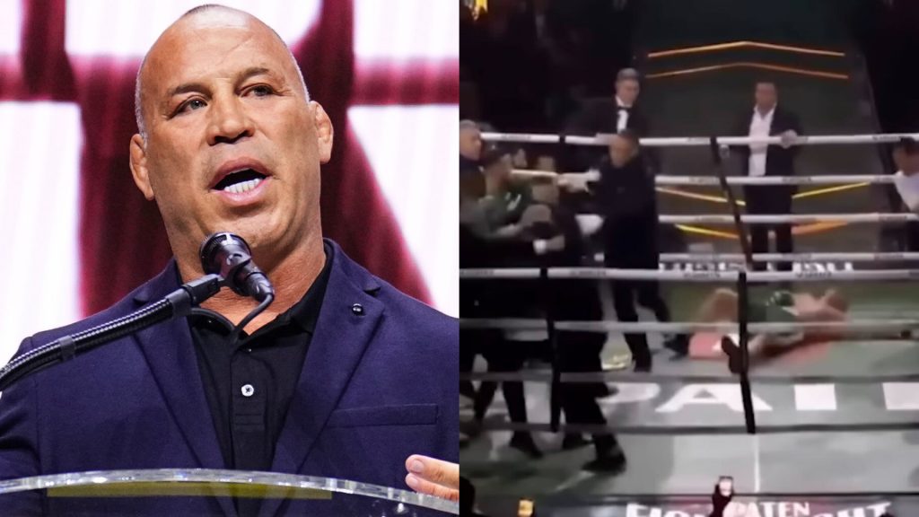 Wanderlei Silva speaks at the UFC Hall of Fame induction ceremony, opposite Silva on the canvas in the boxing ring