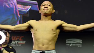 Kyoji Horiguchi poses on the scale during the UFC Belfast ceremonial weigh-in
