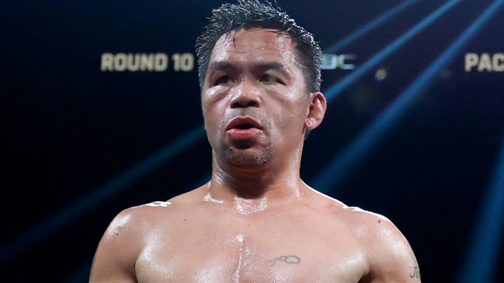 Manny Pacquiao enters the boxing ring for his fight against Mario Barrios