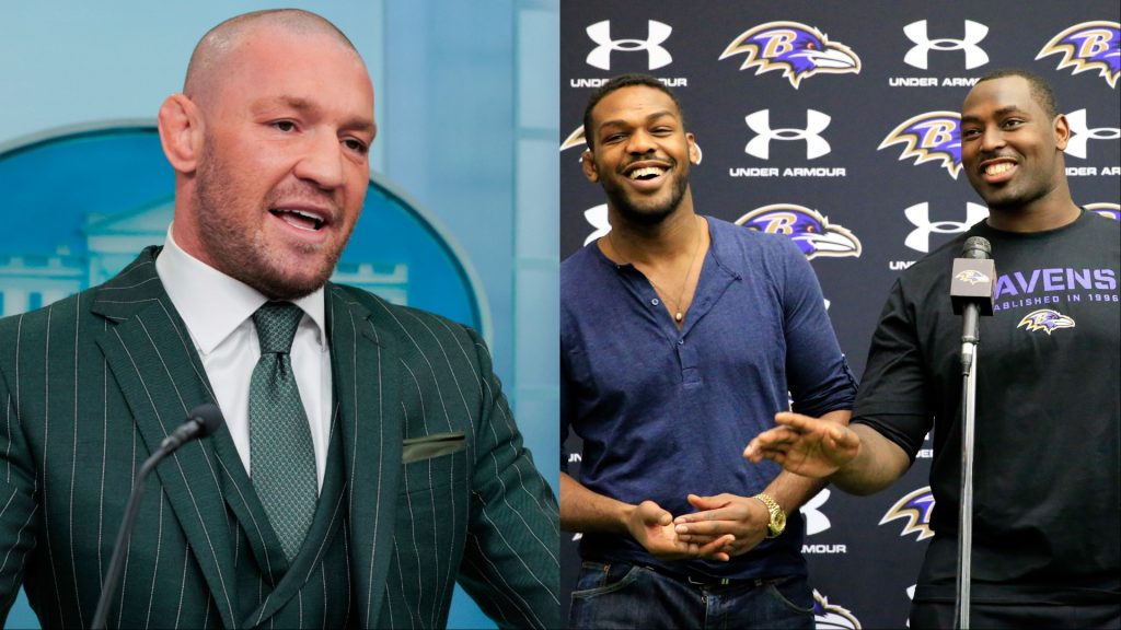 Conor McGregor speaks at a White House press briefing, opposite Jon Jones with his brother Arthur