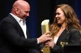 Dana White presents Ronda Rousey with an award at the 2018 UFC Hall of Fame induction ceremony