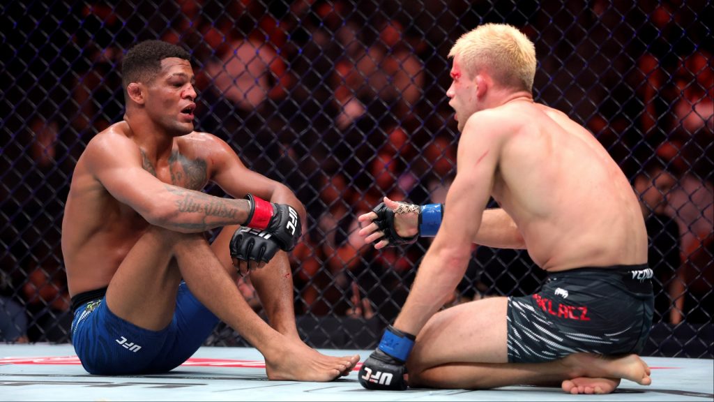 Patchy Mix speaks with his opponent after his fight at UFC 320