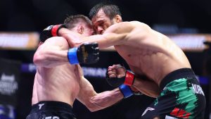 Paul Hughes and Usman Nurmagomedov collide during their fight at PFL Champions Series 3