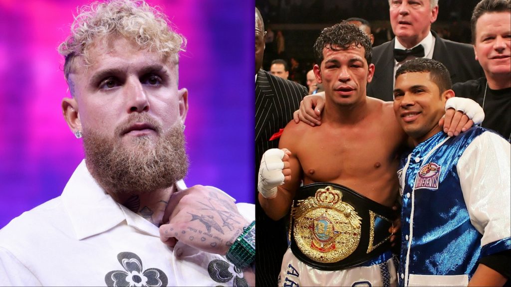 Jake Paul appears at a pre-fight press conference, opposite Arturo Gatti Jr. with his team after a win