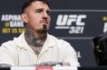 Tom Aspinall appears at a pre-fight press conference for UFC 321