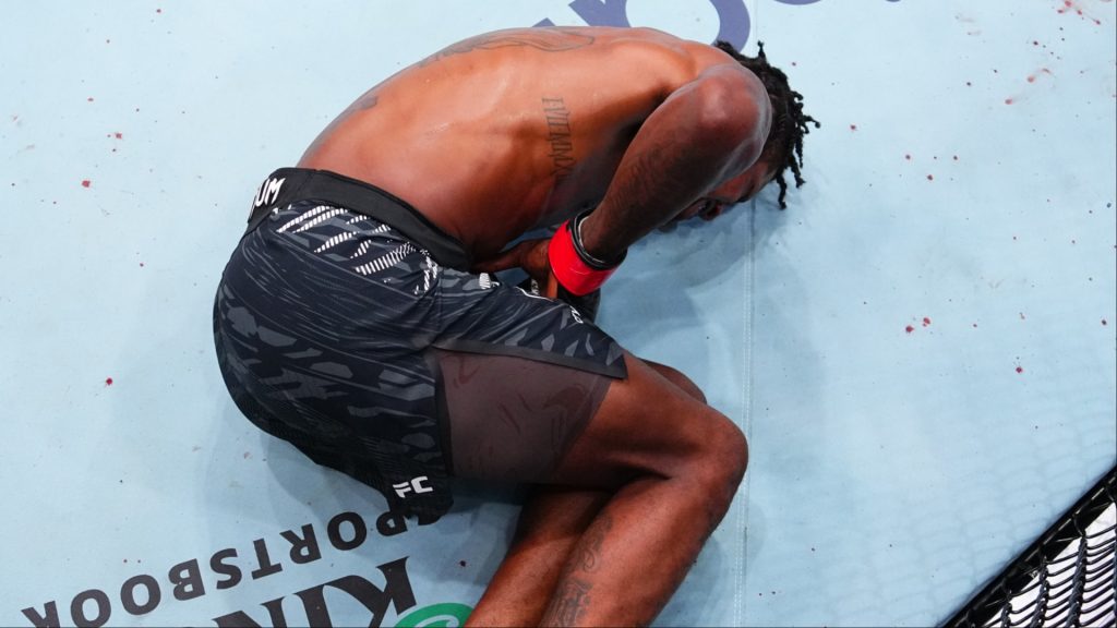 Kevin Holland lies down in the cage during a brief stoppage at UFC Vancouver vs. Mike Malott