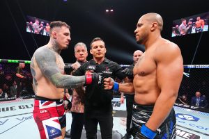 Tom Aspinall and Ciryl Gane fist bump at UFC 321