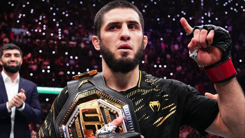 Islam Makhachev celebrates after a title win at UFC 311