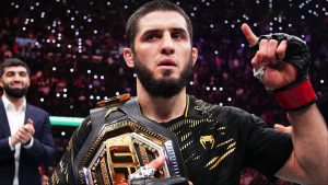 Islam Makhachev celebrates after a title win at UFC 311