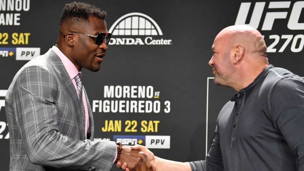 Dana White and Francis Ngannou exchange greetings at the UFC 270 press conference