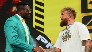 Francis Ngannou and Jake Paul shake hands at the PFL: Battle of the Giants press conference