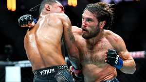 Ethyn Ewing and Malcolm Wellmaker trade punches during their fight at UFC 322