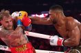 Anthony Joshua punches Jake Paul