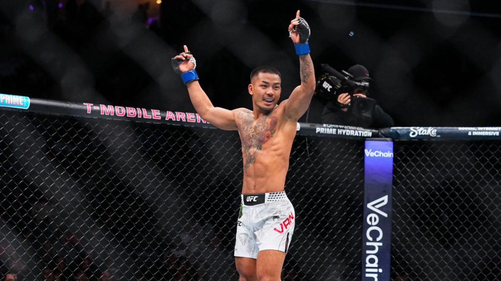 Joshua Van celebrates UFC 323 win
