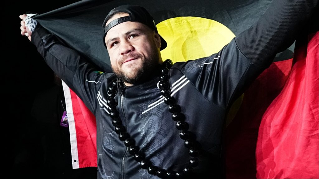 Tai Tuivasa walks to the Octagon for his fight at UFC 305
