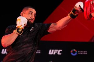 Robert Whittaker hits mitts at UFC practice