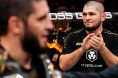 Khabib Nurmagomedov celebrates with Islam Makhachev at UFC 322