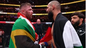 Dricus du Plessis congratulates Khamzat Chimaev after their fight at UFC 319