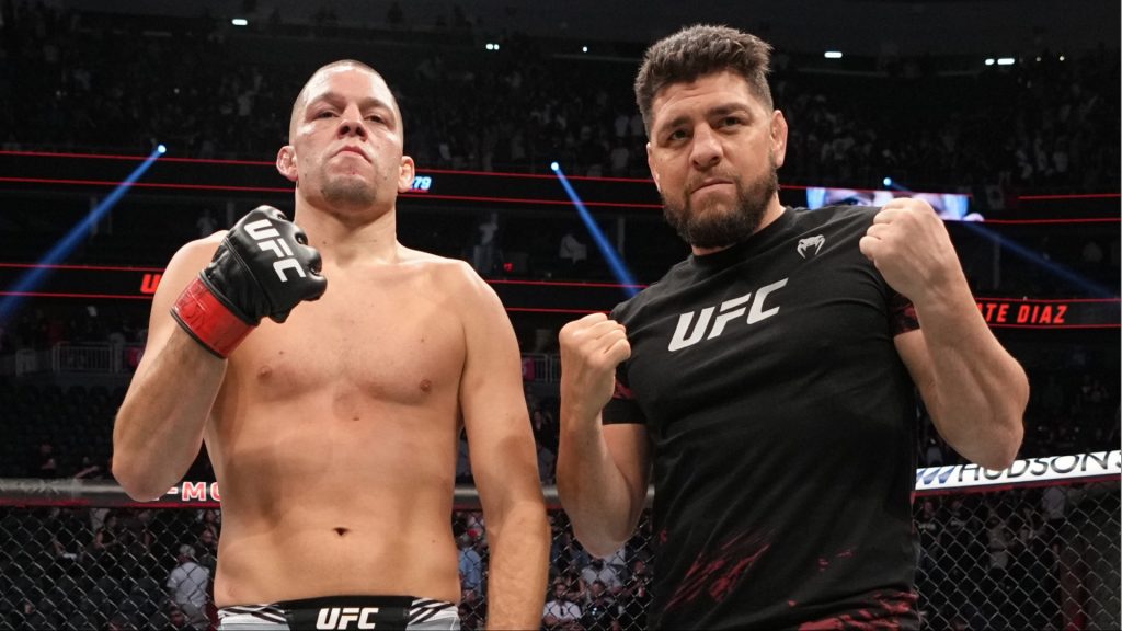 Nick Diaz and Nate Diaz pose for a photo after Nate's win at UFC 279
