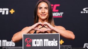 Tecia Pennington poses on the scale ahead of a fight at the UFC Meta Apex