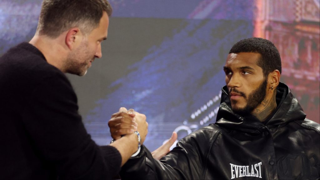 Conor Benn shakes hands with Eddie Hearn