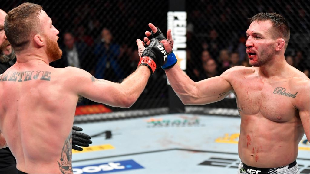 Justin Gaethje and Michael Chandler embrace after their fight at UFC 268