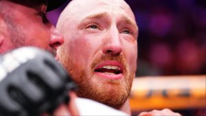 Joe Pyfer embraces his coach following a win at UFC Seattle