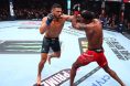 Aaron Pico throws a punch at Lerone Murphy during UFC 319