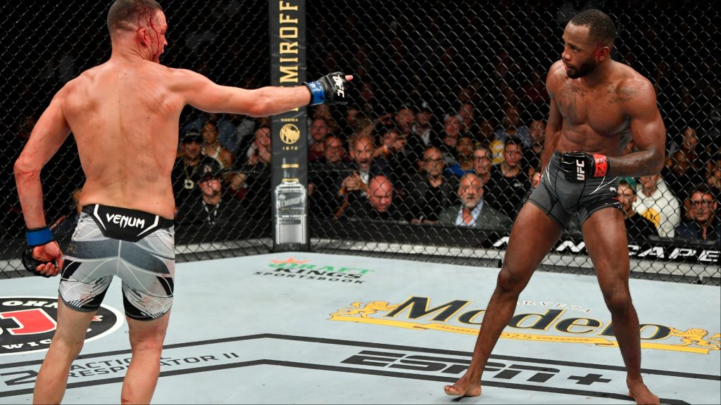 Nate Diaz taunts Leon Edwards during their fight at UFC 263