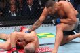Carlos Ulberg punches a downed Jiri Prochazka at UFC 327