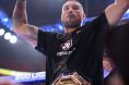 Carlos Ulberg celebrates after winning at UFC 327