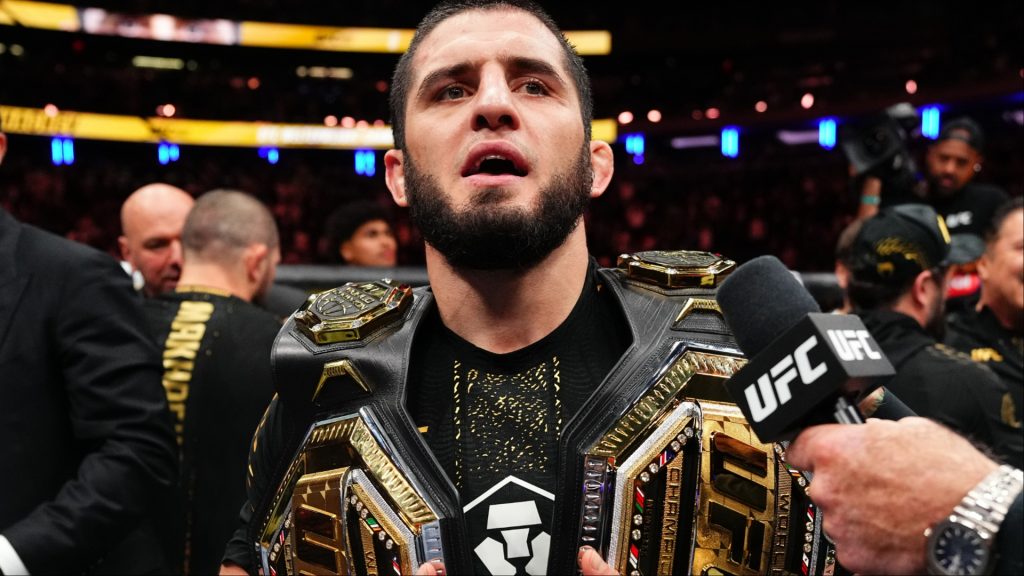 Islam Makhachev with two UFC belts