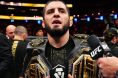 Islam Makhachev with two UFC belts