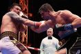 Rico Verhoeven throws a punch at Oleksandr Usyk