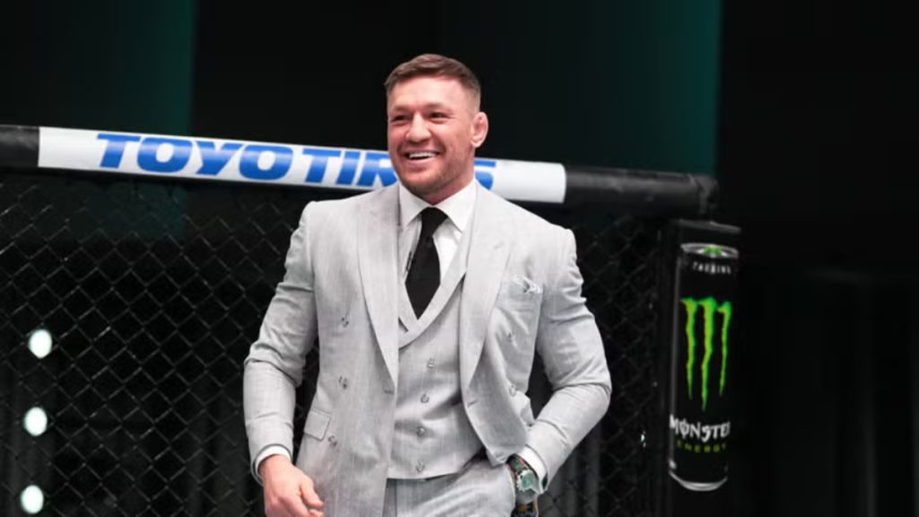 Conor McGregor enters the UFC Octagon in a suit