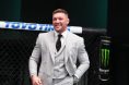 Conor McGregor enters the UFC Octagon in a suit